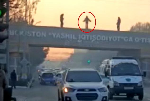 A Young Woman Rescued from Jumping Off a Bridge over a Busy Road In Andijan
