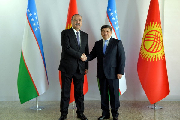 Abdulla Aripov takes part in the opening ceremony of a school in Batken region