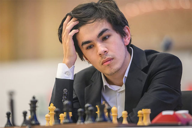 Sindarov holds lead after draw with Caruana